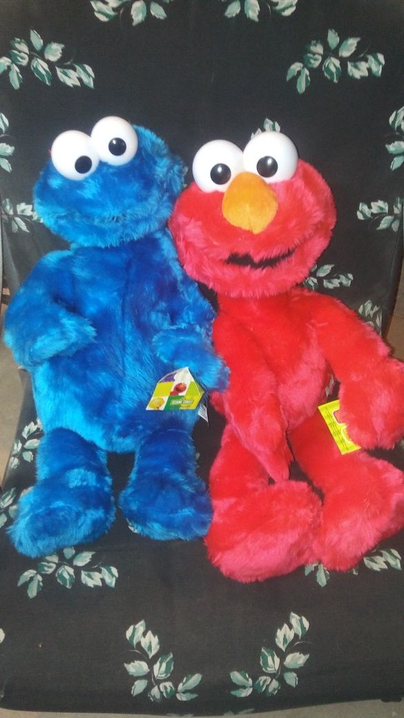 Brand new still have tags on them. Would make excellent christmas gifts Sesame Streets Cookie Monster and Elmo