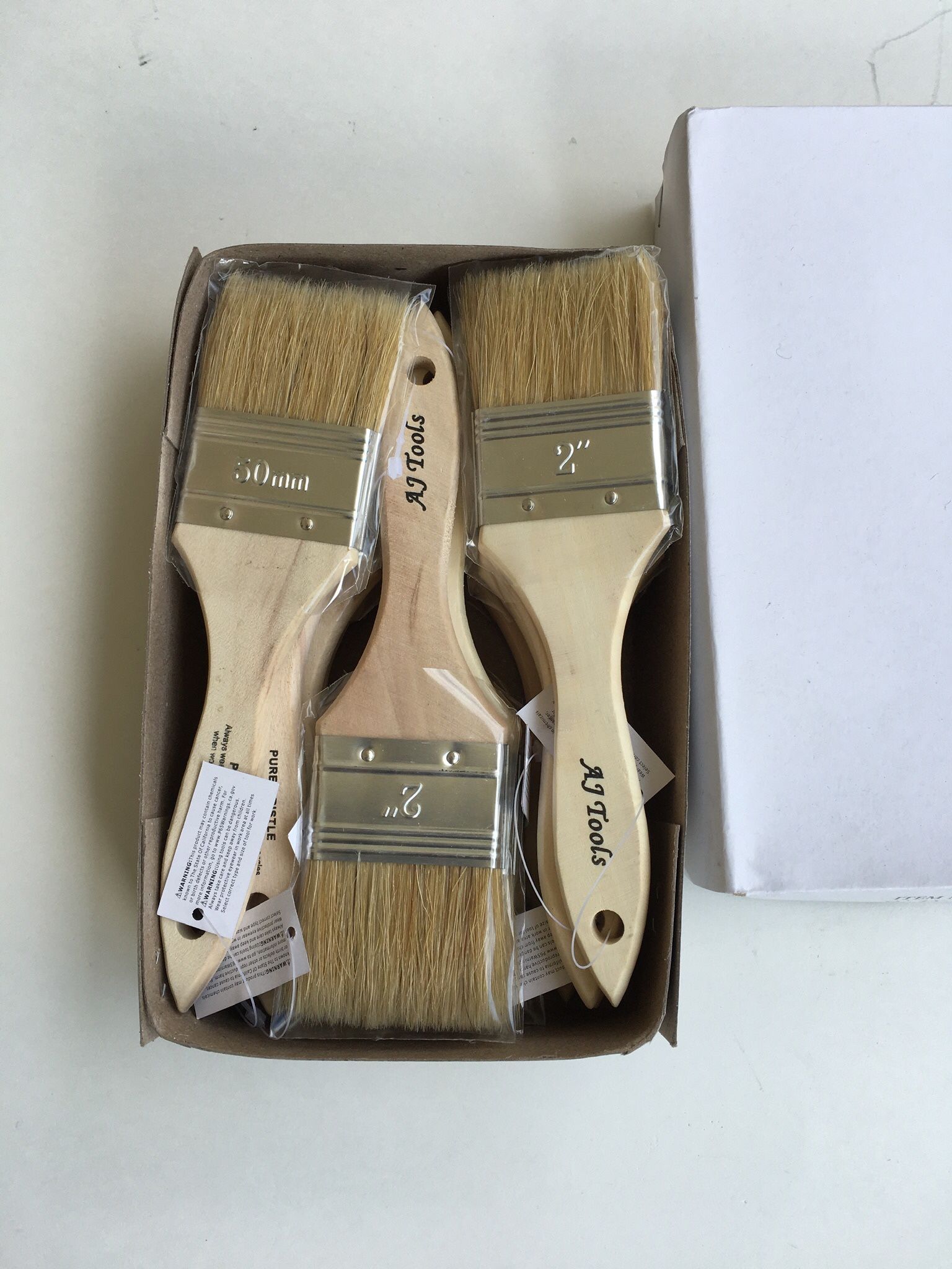12 - 2” PAINT BRUSHES . PRICE FIRM