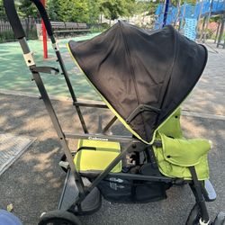 Joovy Caboose Sit and Stand Double Stroller with Rear Bench and Standing Platform