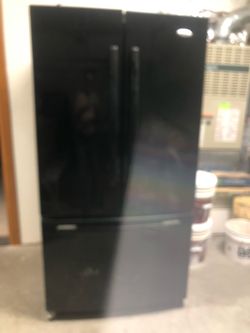 Black refrigerator Whirlpool