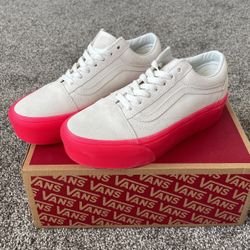 White vans hot sale with pink sole