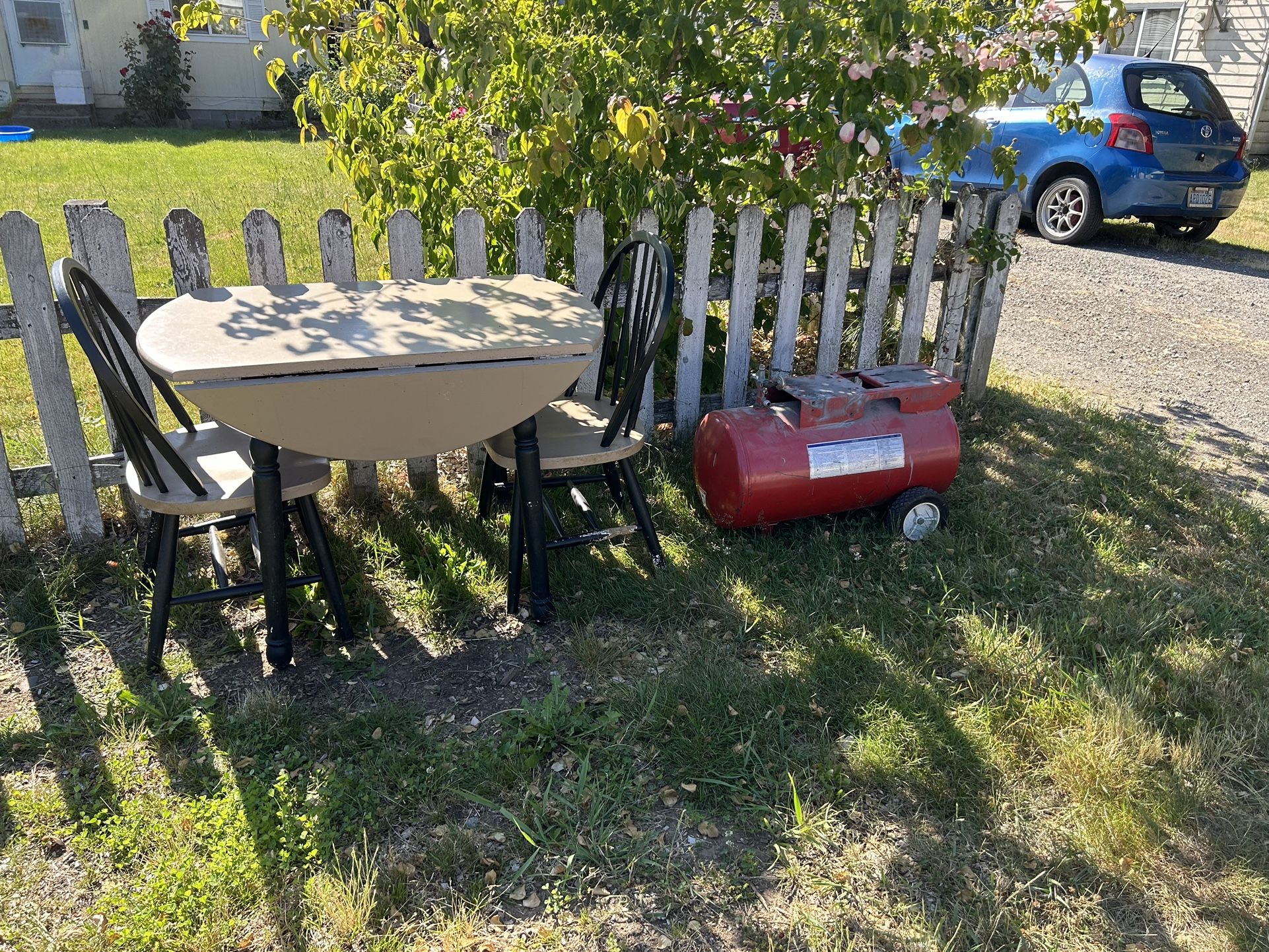 Free Drop Leaf Table And 2 Chairs And A Compressor Tank