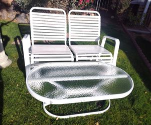 VINTAGE SWING CHAIR AND TABLE $500