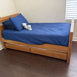 Wood twin bed with trundle