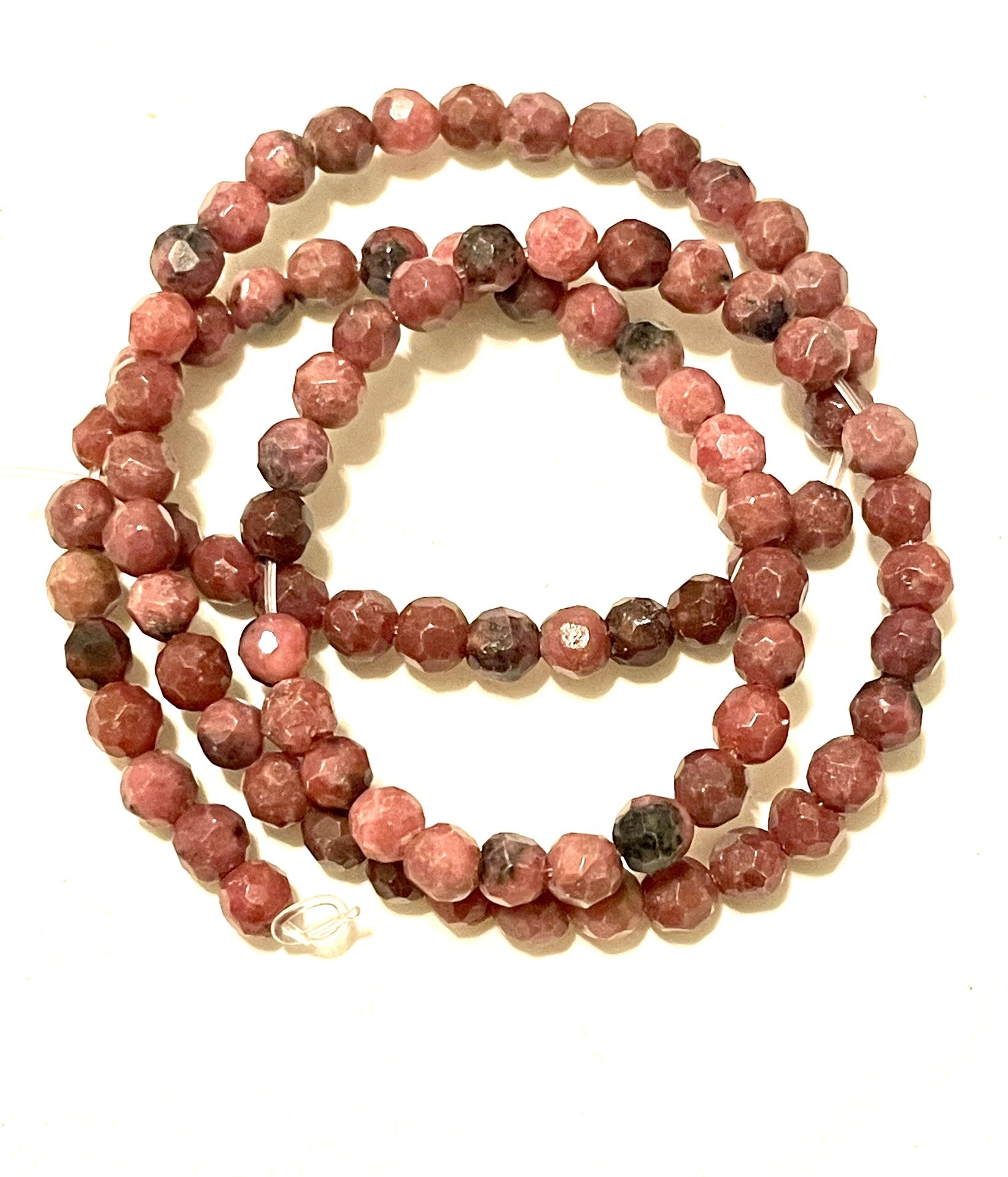 Strand Of Faceted Rhodochrosite Beads