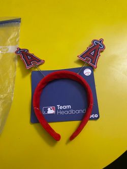 MLB Los Angeles Angels "springy ears" headband features red velvet fabric and two team logo medallions attached to bouncy metallic springs.