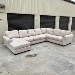 Off White Ashley Furniture 4 Piece Sectional.$649 OBO. Free Delivery!