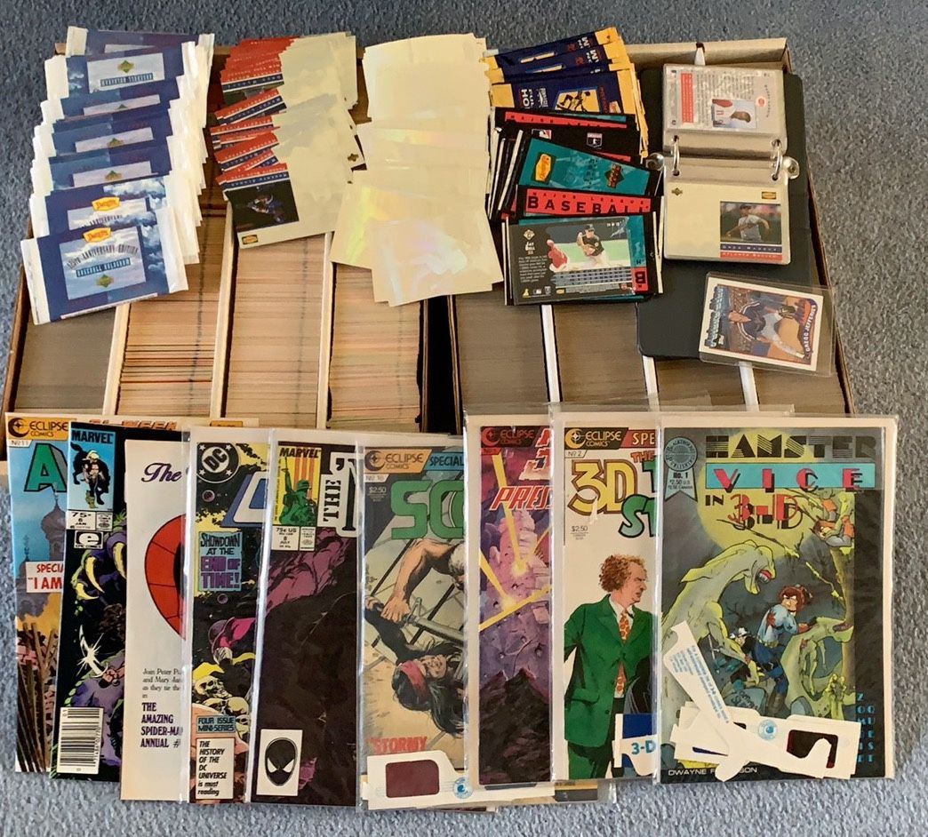 Baseball cards all maxed +9 comic books