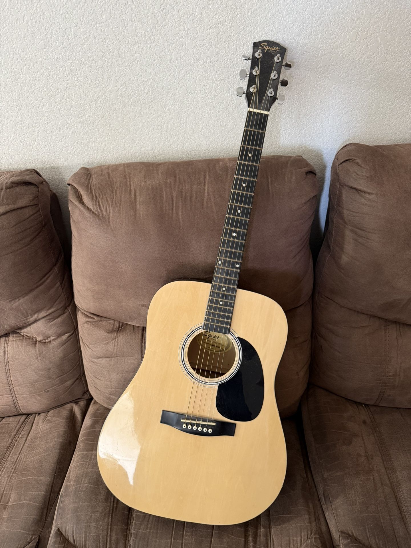 Selling a gently used Squier by Fender acoustic guitar