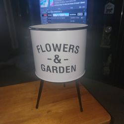 NEW METAL DECROTIVE FLOWER POT. 11.5" T X  7.5" D