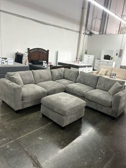 Gray Corduroy Sectional Sofa with Ottoman
