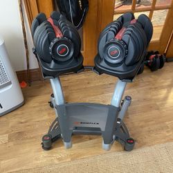 Pair Of Genuine Bowflex 52.5 Lbs Dumbbells With Wheeled Stand 