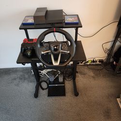 Playstation 4 (Bundle) With Playstation 4&5 Racing Apex Wheel, 2 Controllers, Dual Charger, Games and Game Station. 