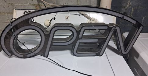 Open sign. Doesn't light up
