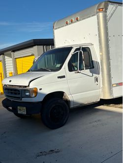 White ford box truck