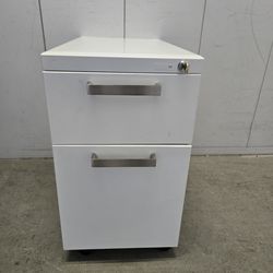 Solid metal file cabinet with key