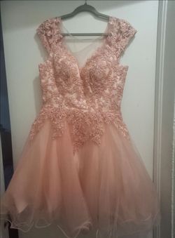 Im selling a pretty pink dress size: L