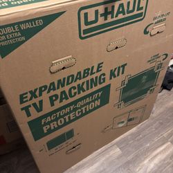Moving boxes/ TV / Art/ Mirror