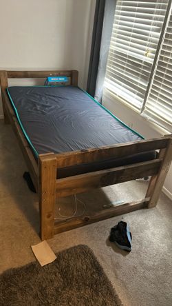 2 wood twin beds