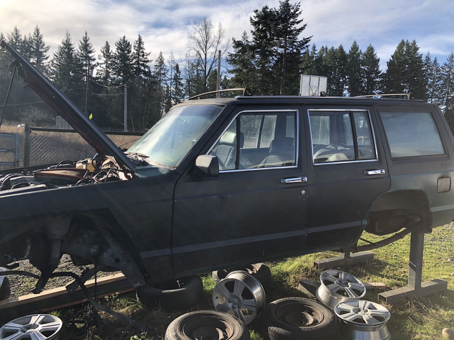 89 Cherokee Jeep for parts or whole. Have title