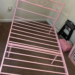 Pink metal bed frame