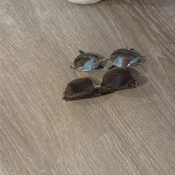 Two Pairs Of Sunglasses