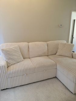 Beautiful White Sofa with Pull-Out Bed, USB Charging Ports & Cup Holders!