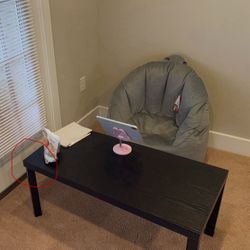 Moving Sale: Black Coffee Table (one leg issue – circled in pic)