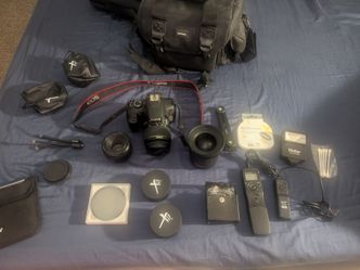 Canon rebel t6 with Rokinon 16mm lens, canon 50mm, and other misc camera lens/accessories
