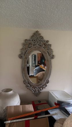 Ornate Oval Wall Mirror with Carved Frame