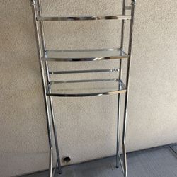 Three tier metal and glass shelving unit