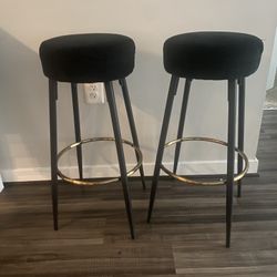 2 black velvet bar stools 