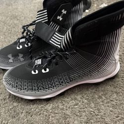UA Black cleats