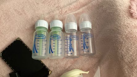 Two Plastic And Two Glass DrBrowns Bottles 