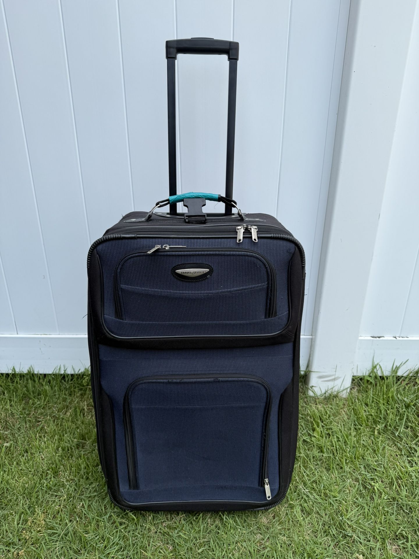 Dark blue medium checked luggage
