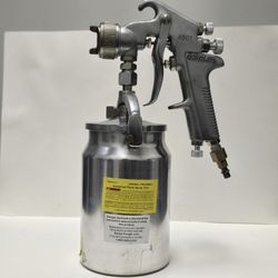 Central Pneumatic #4001 industrial paint spray gun. It is a siphon-feed spray gun with a 32 oz aluminum cup. 
