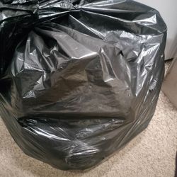 10-15lb Bag full of Women's and Men's Clothes
