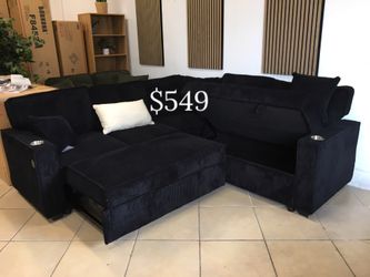 Stylish sectional sofa with pull-out bed & storage