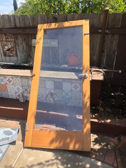 Wooden glass door. Glass door. Wooden door