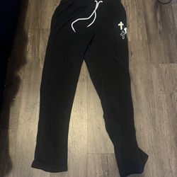 Black flared pants with  cross