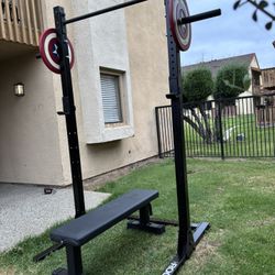 ROGUE SML-2C SQUAT RACK WITH STORAGE PEGS AND TITAN FLAT WEIGHTS BENCH Prices Listed At The Bottom Under Description 👇👇👇👇
