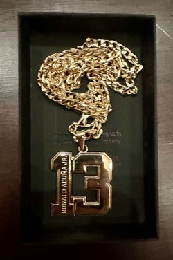 Ronald Acuña Jr #13 Replica gold chain given out at Truist Park