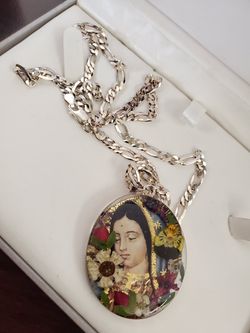 Silver chain and charm