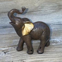 Brown Elephant Statue With Gold Ears 
