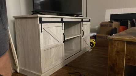 TV holder with compartments for all sorts of game hook ups