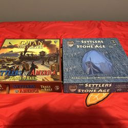 Board Games- Settlers Of America & Settlers Of Stone Age