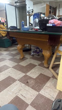 Old school pool table with balls also have a ping-pong table top