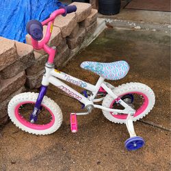 BICYCLE for a very small child; cross streets are Arapaho & Waterview