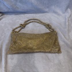 Gold bejeweled bag