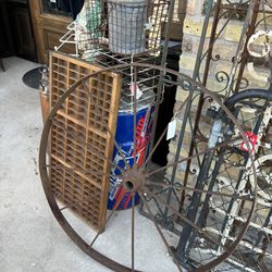 36 inch old metal wheel.  125.00.  Johanna at Antiques and More. Located at 316b Main Street Buda. Antiques vintage retro furniture collectibles mid-c